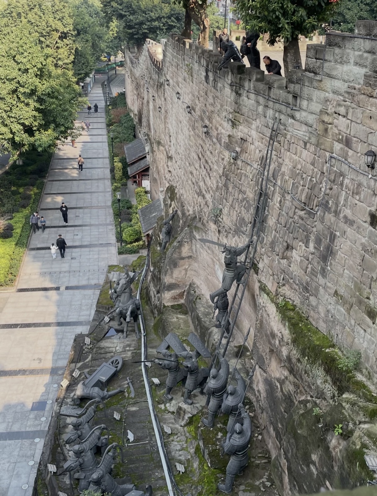 Elias and private guests exploring contrasting daytime and evening Chongqing neighborhoods